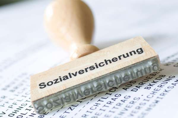 Holzstempel Sozialversicherung